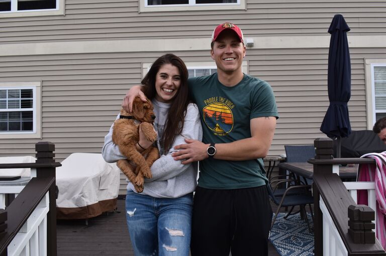 Dan and Sam's first picture together when they brought Rhett home 2 weeks after dating!