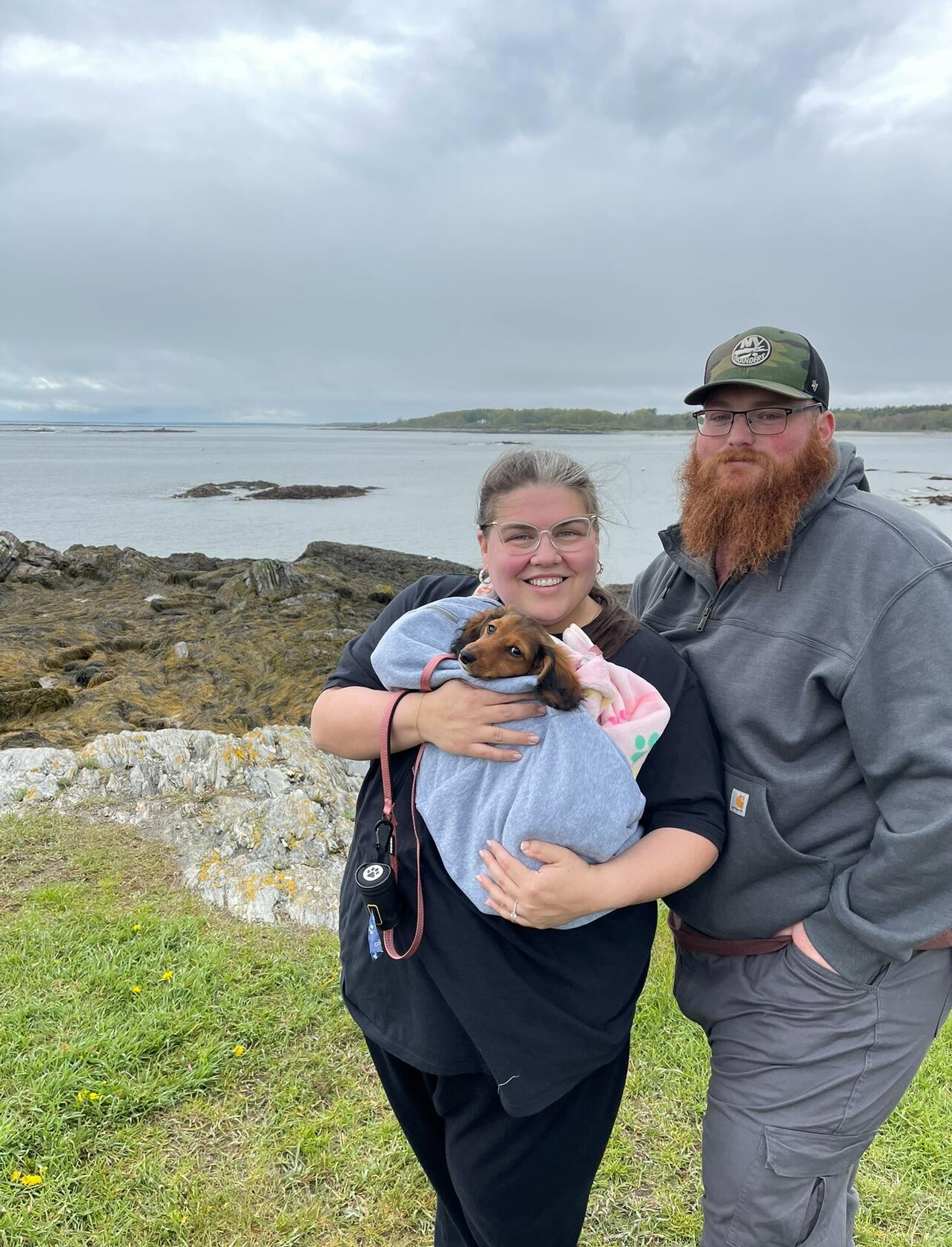 Going back to Maine with our new puppy felt like coming full circle. This time, we had Lucy trotting alongside us, her little tail wagging as we showed her the place where our story took such a beautiful turn. We retraced our steps with Liz and Sam, laughing about that perfect day when Danny got down on one knee. The ocean breeze was the same, the view was just as breathtaking... but somehow, it all felt even more special with Lucy there, making new memories in the place where one of our favorite chapters began.