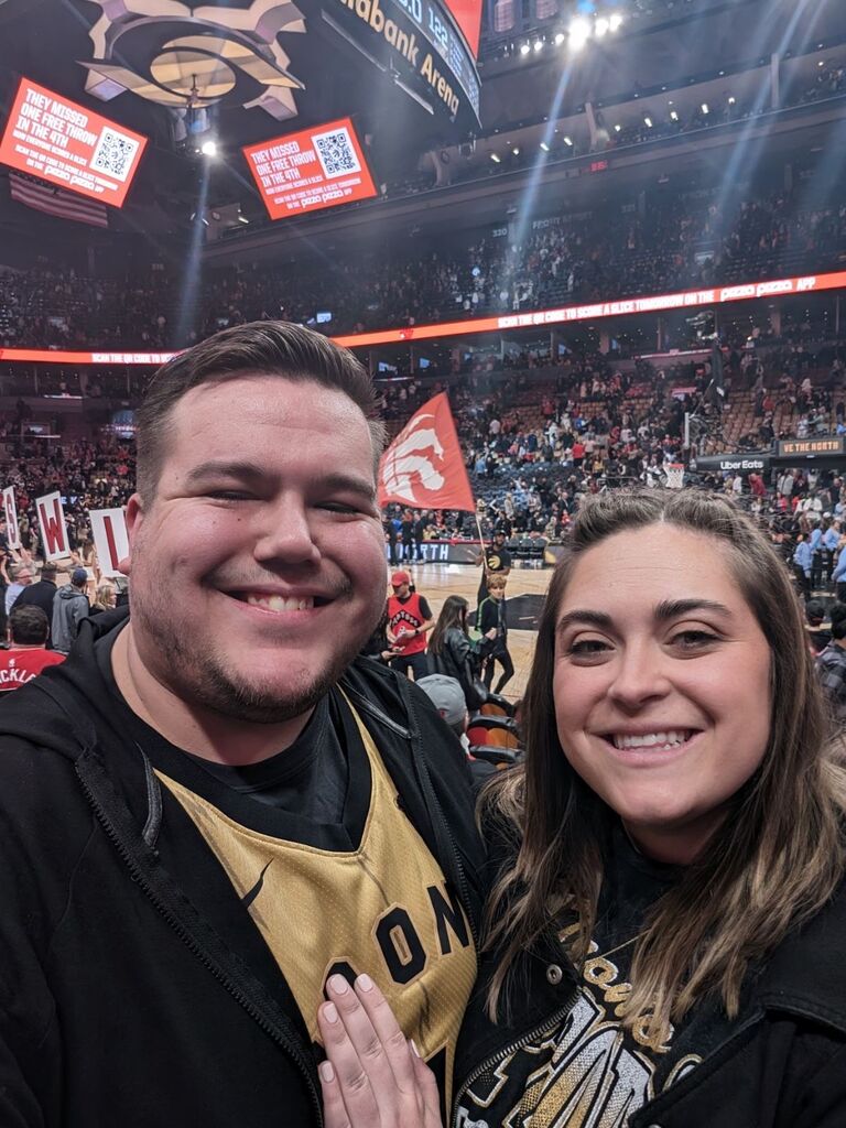 Toronto Raptor's Game the day before Jordan proposed. Despite Megan's hand placement she was clueless about what was about to happen the next day.