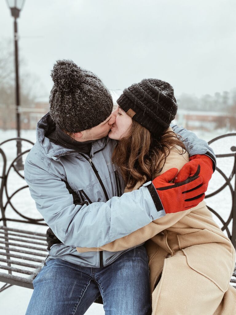 The two share a kiss on their first snow day together!