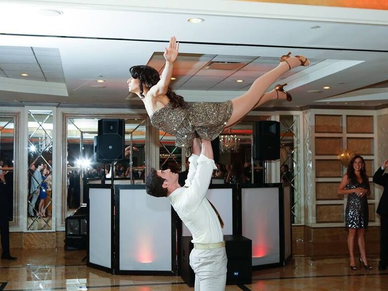 Couple doing an impressive lift on the dance floor