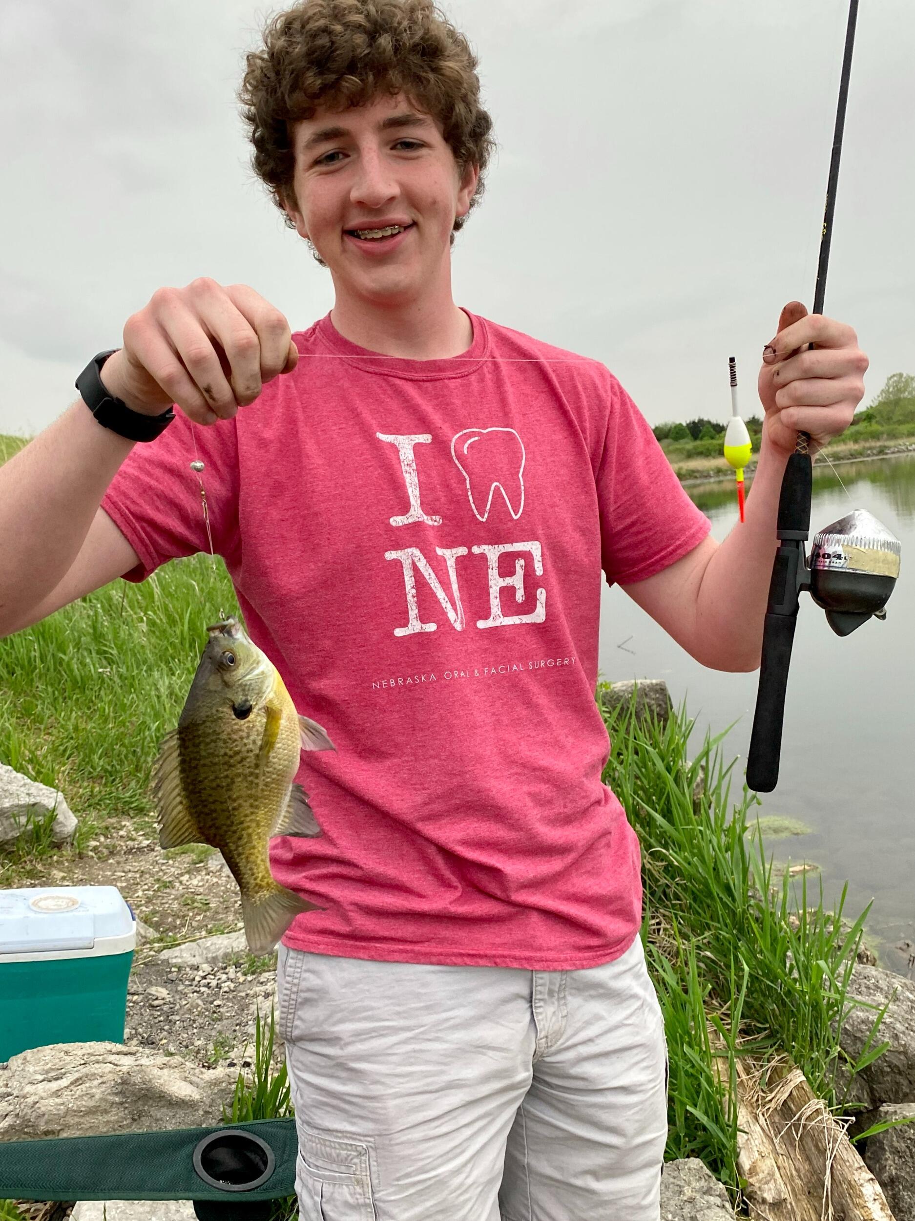 Scott caught his first fish ever on our fishing date.