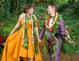 American wedding traditions: brides at Hawaiian wedding with leis