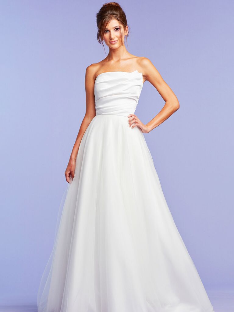 tadashi shoji plain ivory strapless wedding dress with ruched chest and pleated ball gown skirt