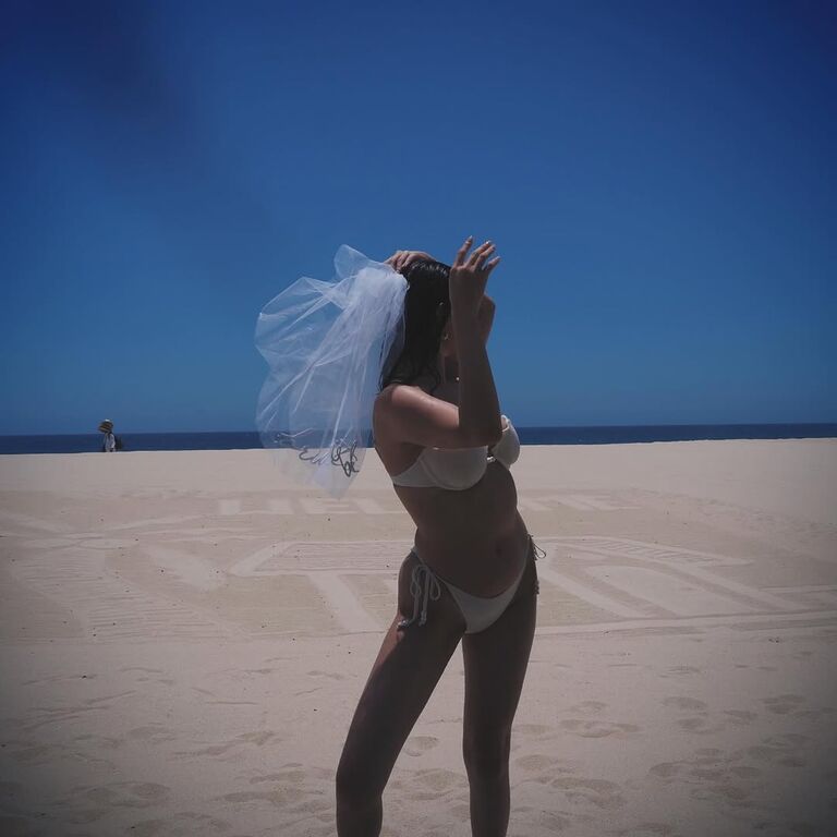 Selena Gomez in a white bridal bikini on her bachelorette party