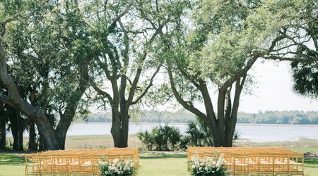 A perfectly timed winter wedding at Lowndes Grove that's all aglow, Charleston, SC