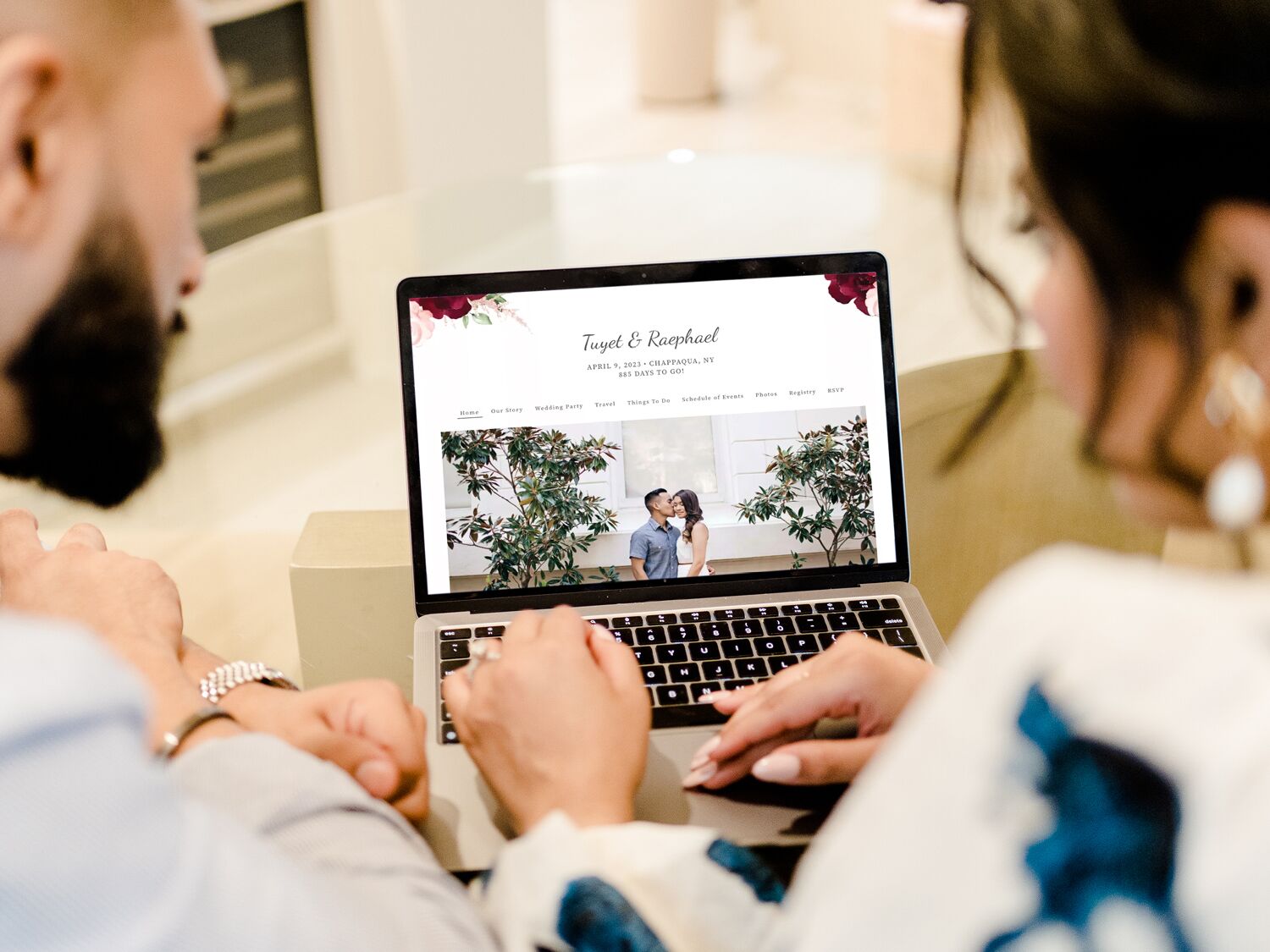 Couple looking at a wedding website 