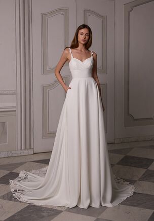 The Moonlight Tango T226 wedding dress exudes romantic elegance with delicate lace straps, a sweetheart surplice bodice, and a fitted net back adorned with lace appliques. Its full A-line skirt flows into a cutout lace sweep train with scalloped edges, creating a modern yet timeless bridal look in ivory and light nude.