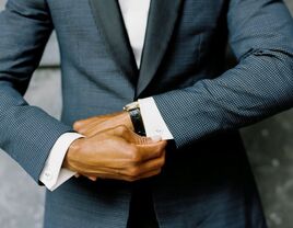 Groom looking at watch