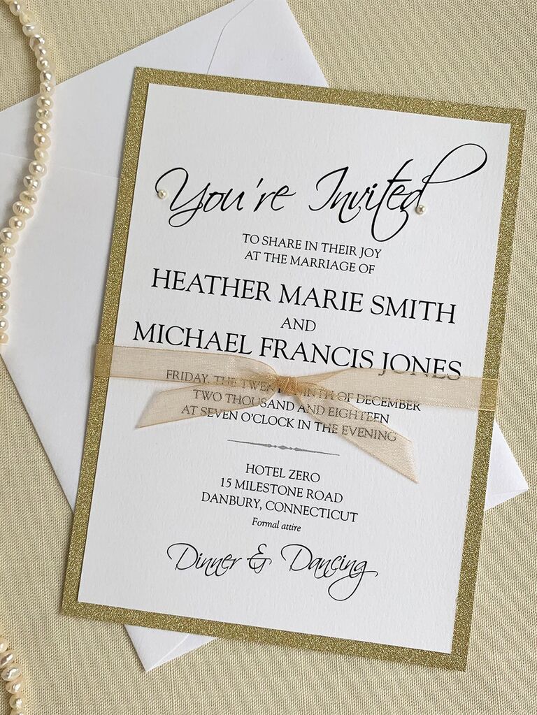 Black type on white background with by glittery gold border and two pearl details on 'You're invited'