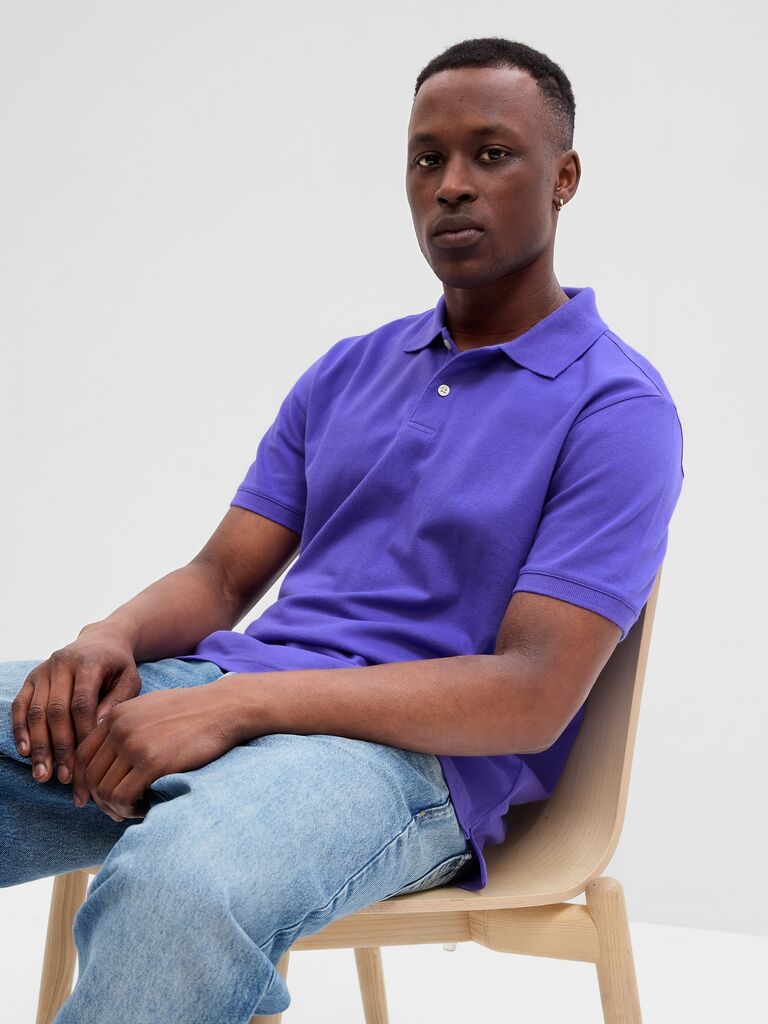 A purple short sleeve polo shirt with white buttons from GAP