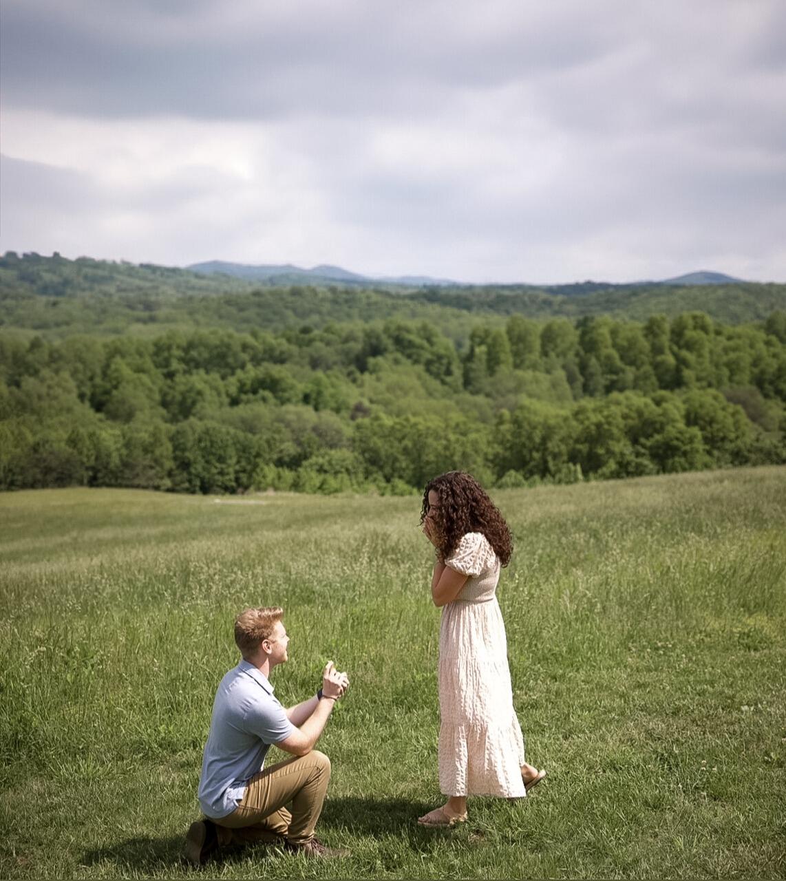 Michael asked Em to marry him and spend the rest of her life by his side. After much shock and disbelief, she said "Absolutely, yes." Michael did not even realize the coincidence of the timing, but this was 6 months to the day after their first date.