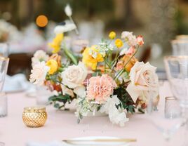 summer wedding centerpiece with yellow and blush roses