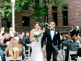 couple at wedding recessional
