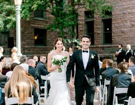 couple at wedding recessional