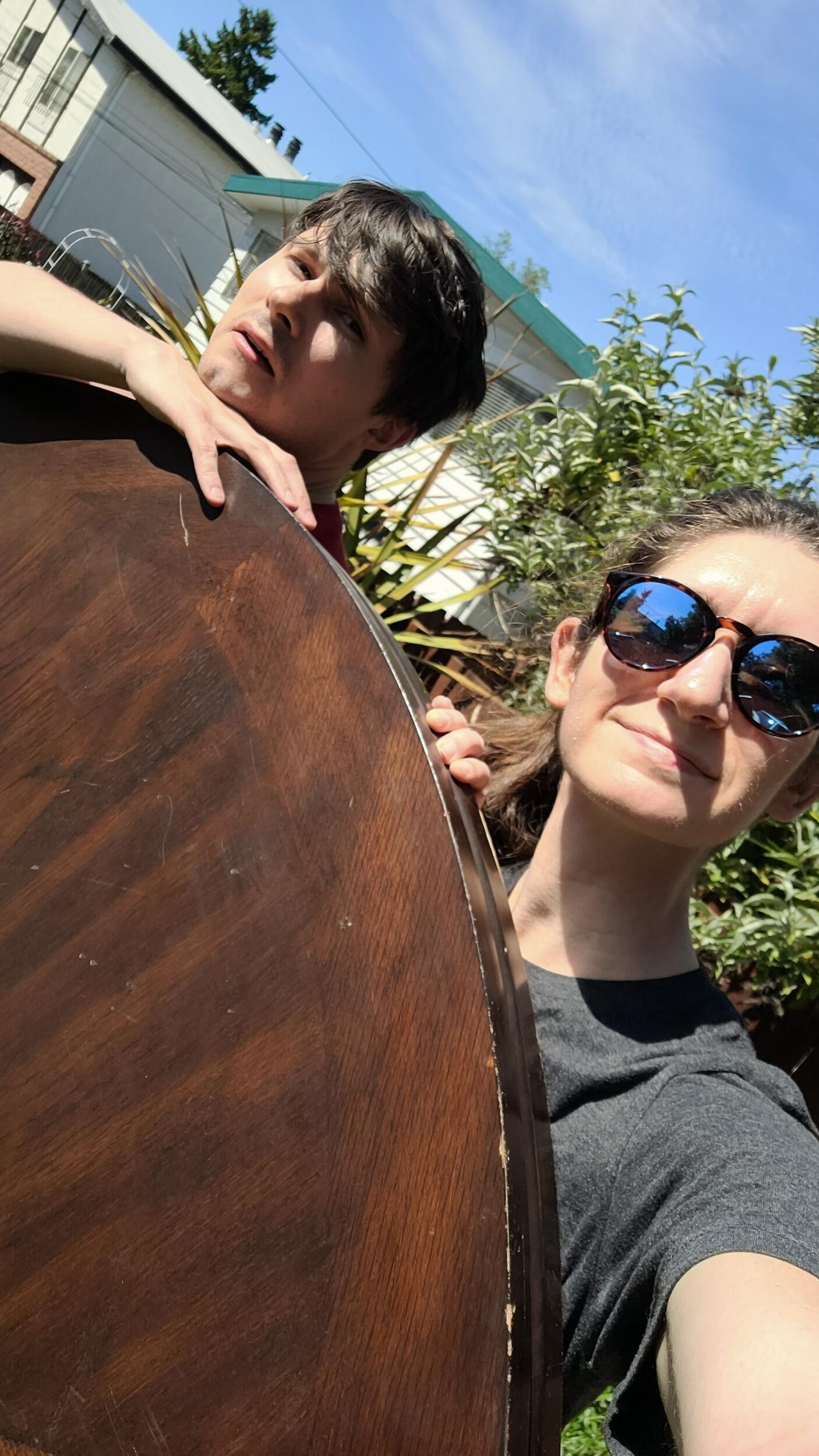 A sucker for a deal - Jake and Amanda carried and rolled an 80 lb table for 1 mile back to their townhouse knowing it would be perfect for the house they were about to move into.