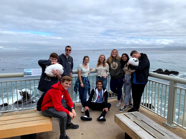 Glad and Jeremy (far right) started being closer friends in their Sophomore year of high school. This photo was taken during their class field trip to the Monterey Bay Aquarium. 