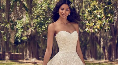 Separates wedding dress composed by a lace bodysuit with open back