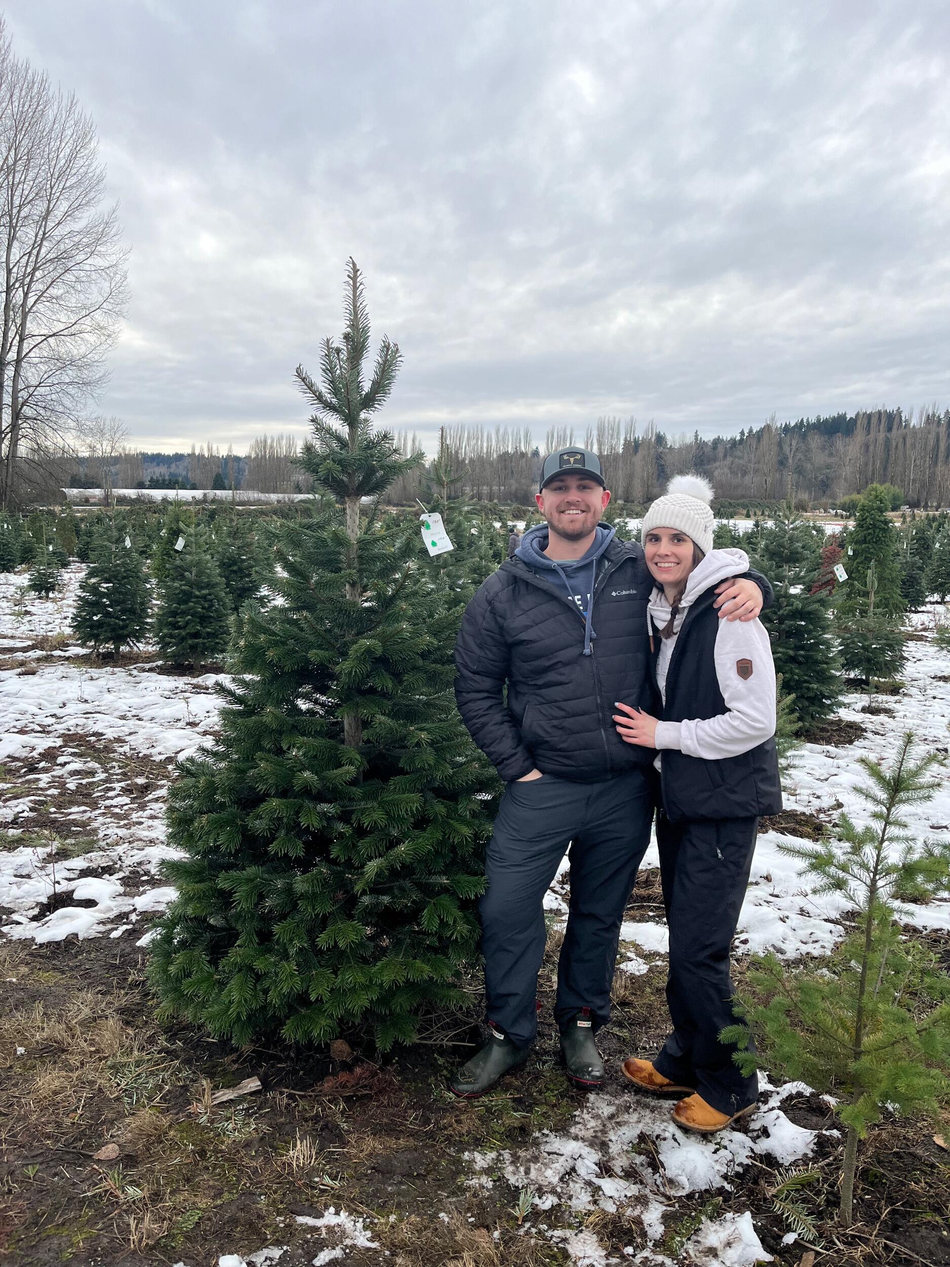 Travis and Lizzie picked out their first Christmas tree!