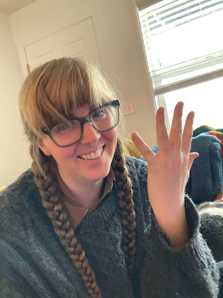 The first photo of Hazel in her ring after DH proposed on Christmas morning,