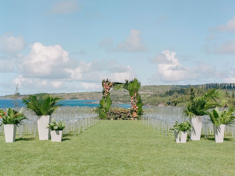 Tropical ceremony arch covered in leaves