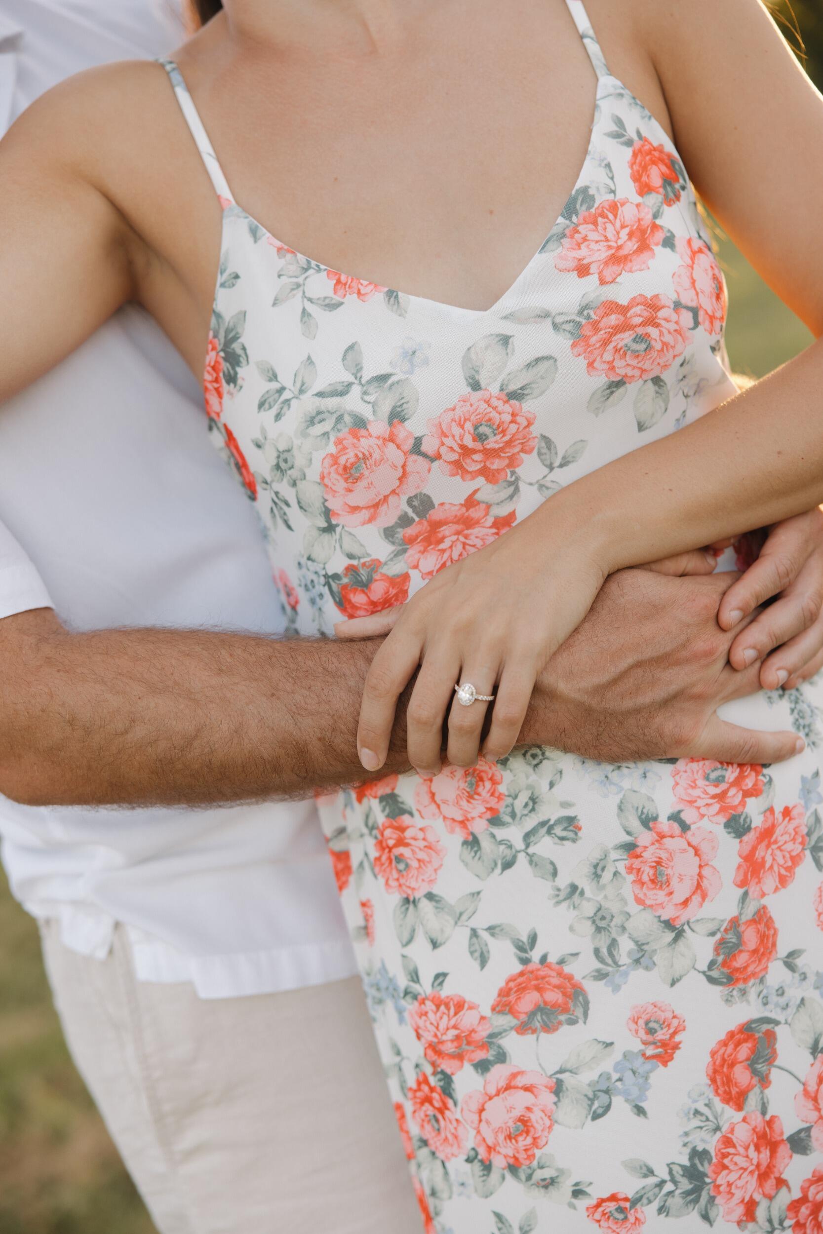 Jacob decided to not only buy a ring, but to design it all on his own. He made it everything I had hoped for and used his grandmother's diamonds in the band.