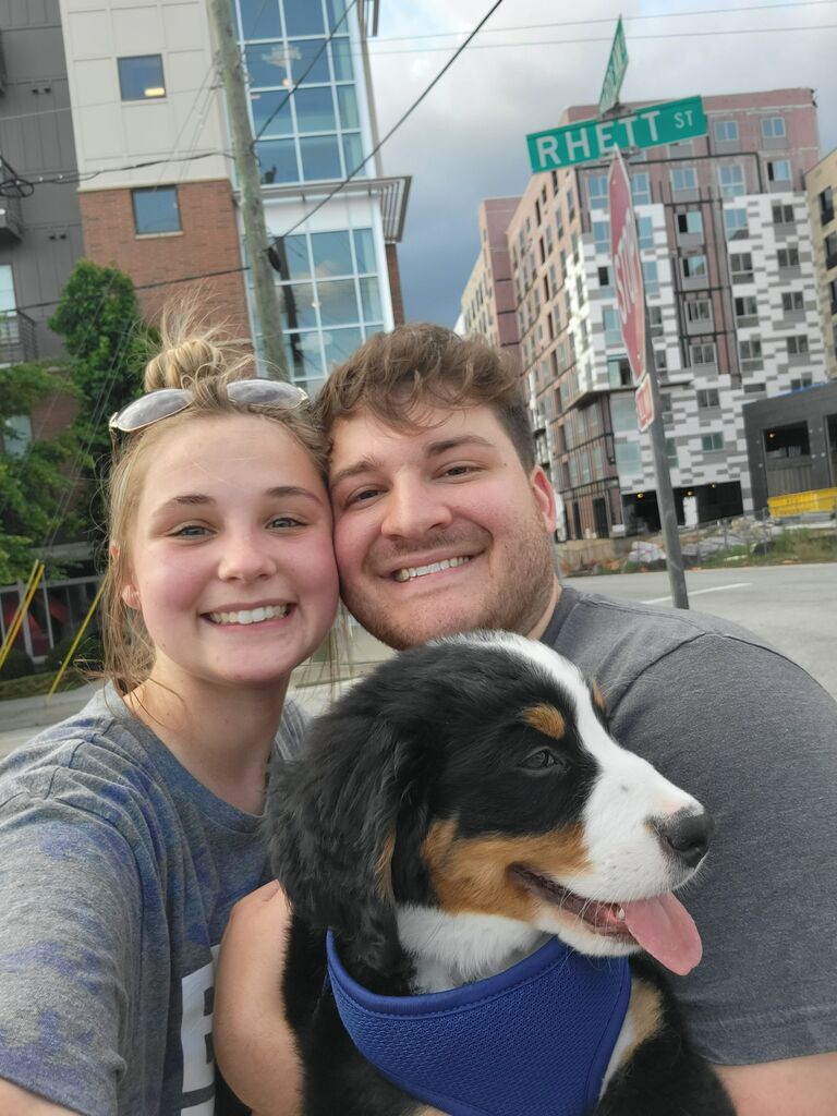We got our first puppy Rhett, named after the street we met on!