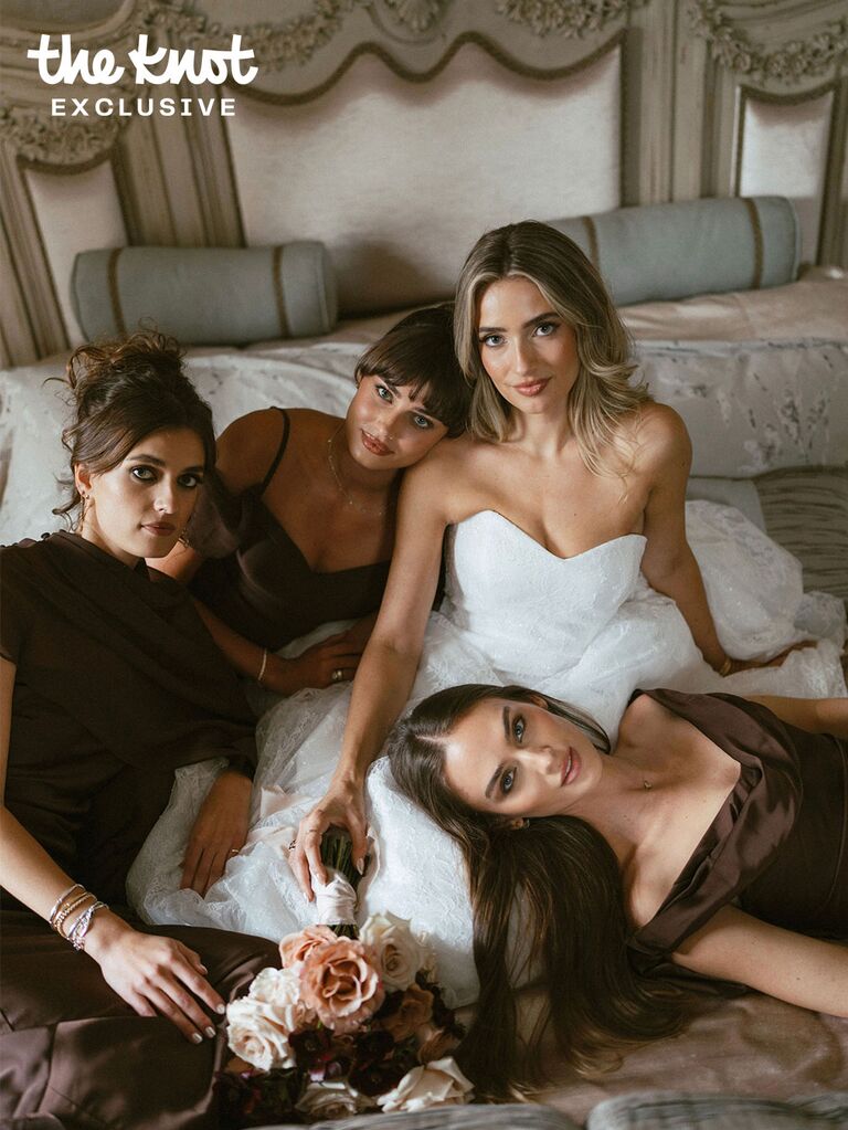 Logan Rae Hill posing with her sisters Taylor Hill and Mackinley Hill on her wedding day