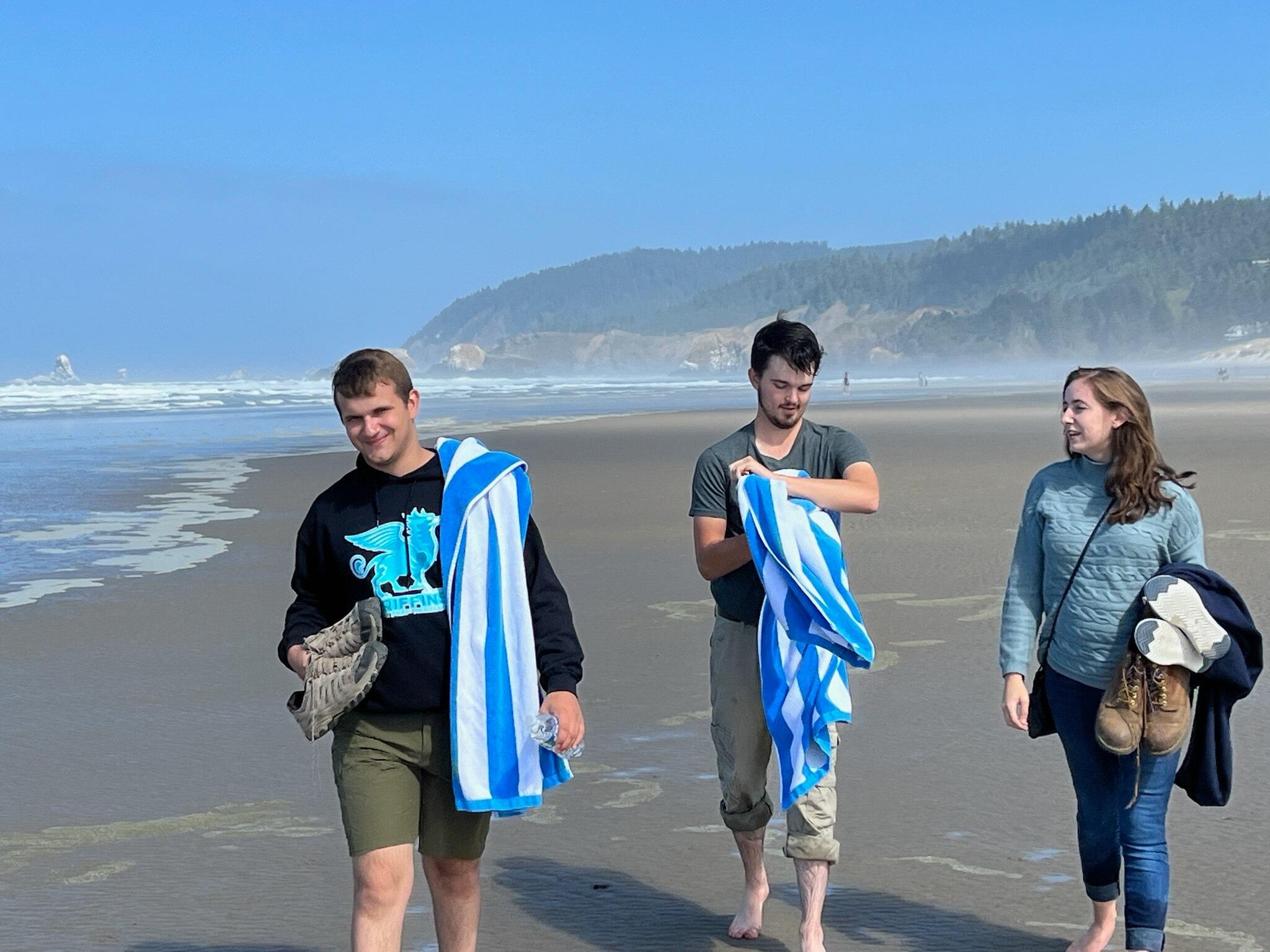 During that trip, Sam got to dip his feet in the Pacific Ocean for the very first time! Here he is, drying off after the experience.