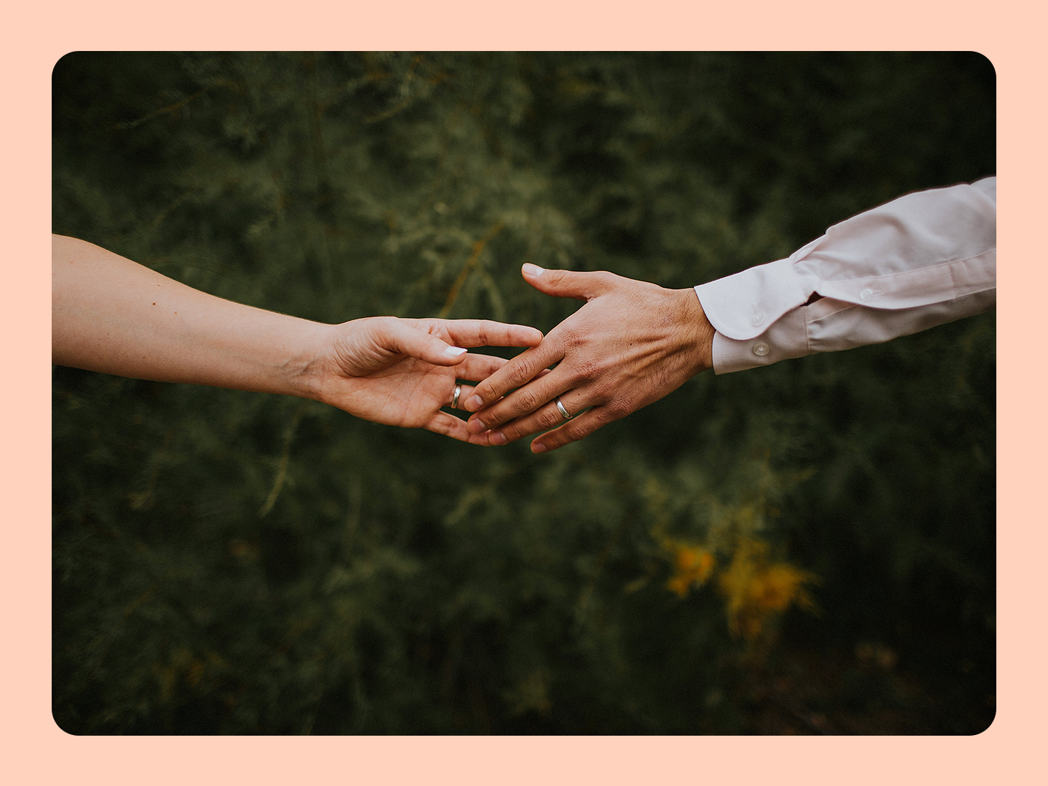 Couple holding hands and smiling