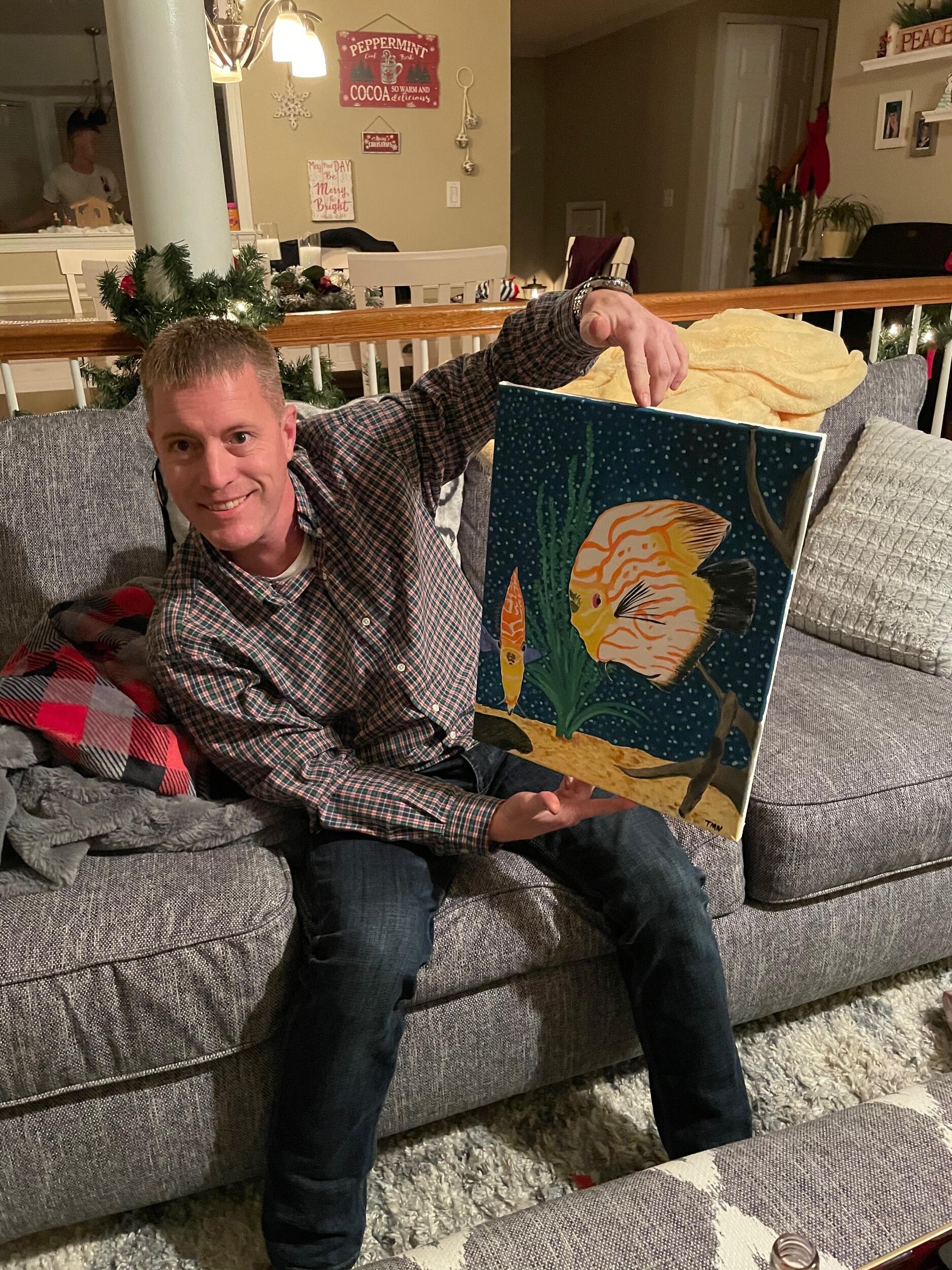 Christmas with Eric and all three of my kids couldn't have been more perfect! They attended Christmas service with us and then came back for Christmas Eve festivities.  I had a very special gift I'd been diligently working on for Eric.  My daughters knew about the painting because they would come over and we'd all paint together on my living room floor. They were excited to see his reaction!  Since his favorite fish is the Discus, I decided to employ my fledgling skills and create an unforgettable rendition of his beloved underwater inhabitants.