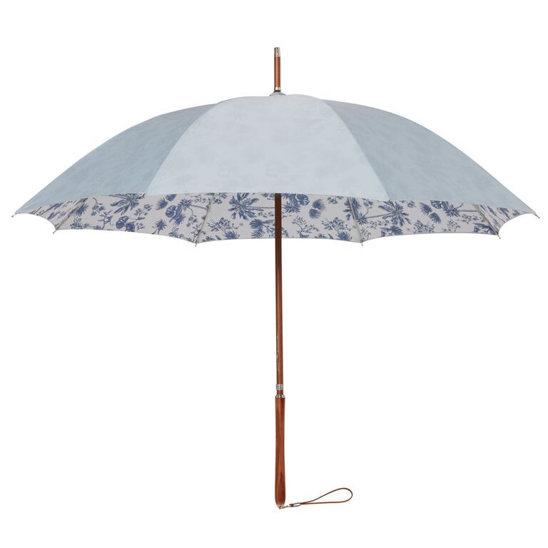Beautiful light blue umbrella with a stylish pattern on the inside. 