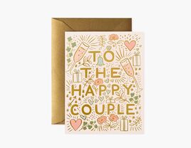 To the happy couple in gold minimal type with floral, presents, and heart graphics in pastel color palette