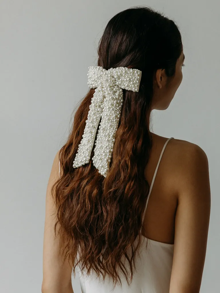 Cute pearl bow from Vow'd  Wedding hairstyles, Bridal hair accessories,  Wedding hair accessories