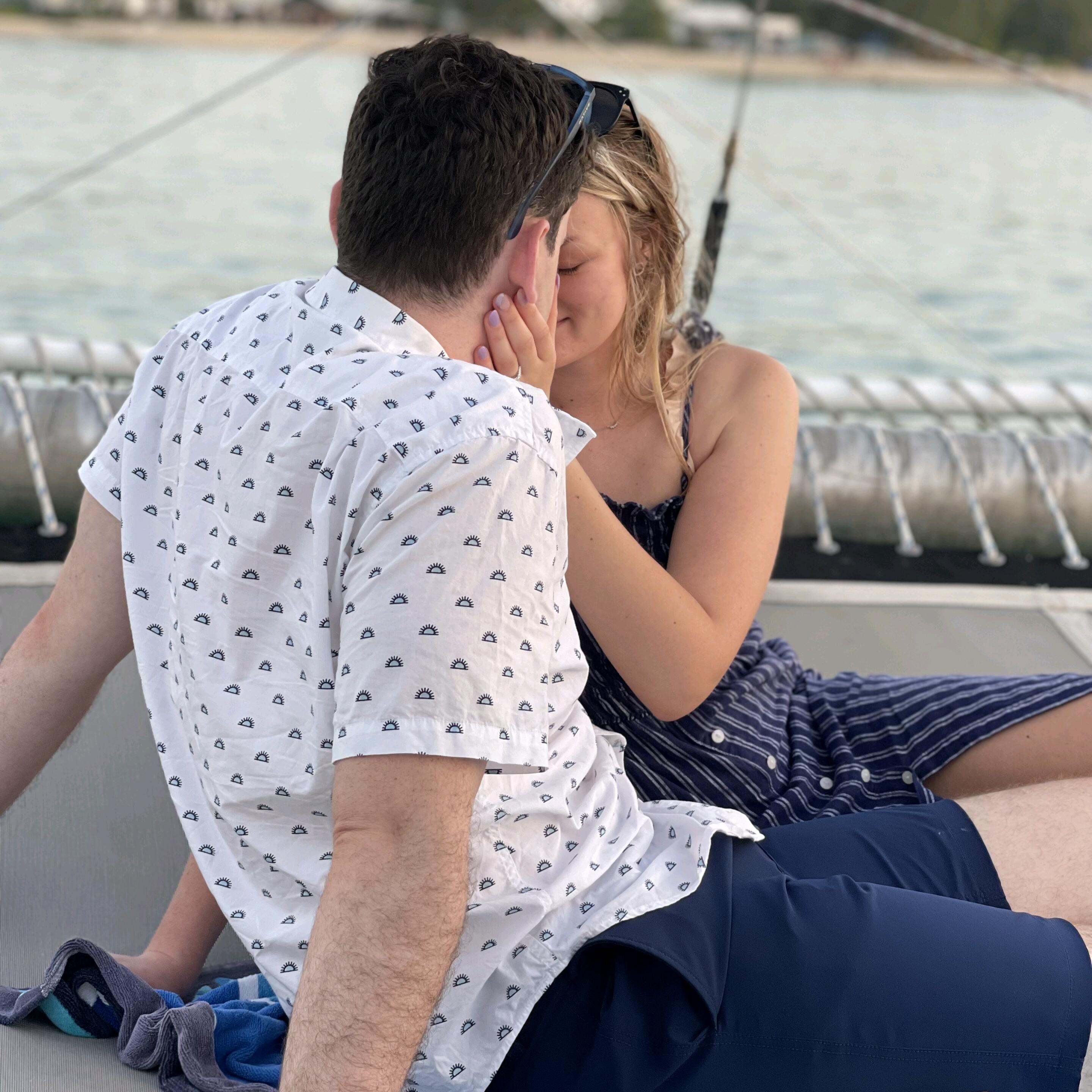 Engaged! After 5 years together, the day finally came (and Taylor was still oblivious and shocked). Cam seized the opportunity on our sunset snorkel trip to propose over the water. She said yes!...after asking if the ring was insured first.