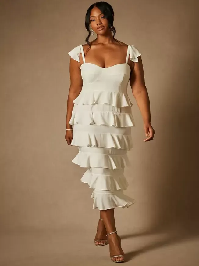 bride in corseted tiered midi dress