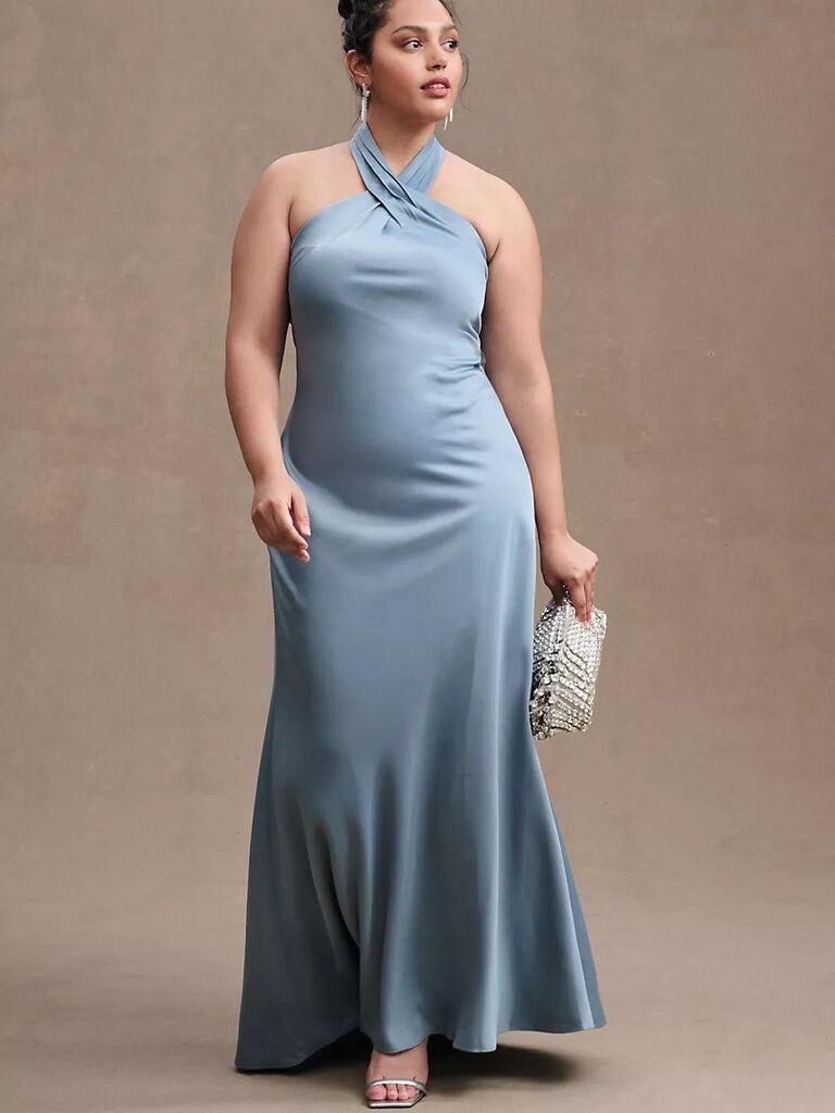Model wears light blue silky formal dress