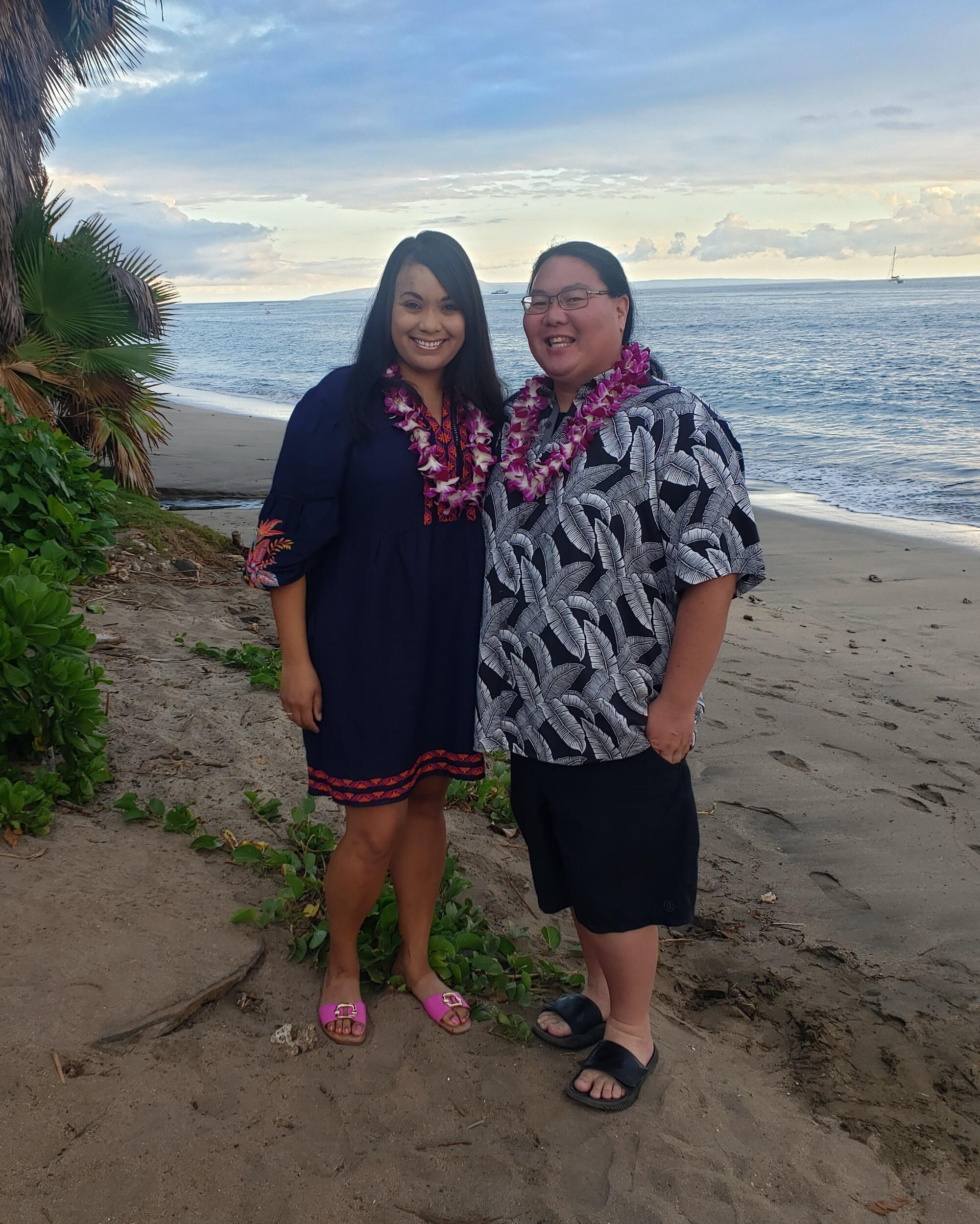 The couple enjoyed watching the sunset while sitting on the beach, attending a luau and more.