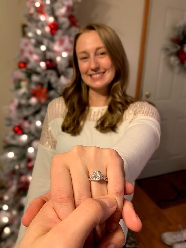 On New Years Eve, seconds before the ball drop, Alex got down on one knee in their little apartment and asked Amanda to go into 2021 as his fiance. 