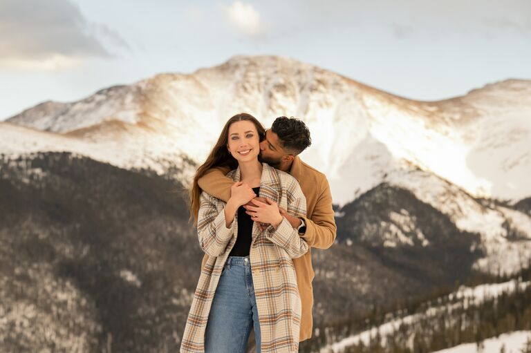 Lucas proposed to Charlotte on her birthday! She was convinced the ski trip was solely planned around both birthdays and had no idea that he brought in friends and family from all over the country for the surprise. At first, she thought Lucas lost his contact in the snow when he dropped to his knee to propose. After she realized what was happening, she blacked out. Thankfully she still managed to say yes!