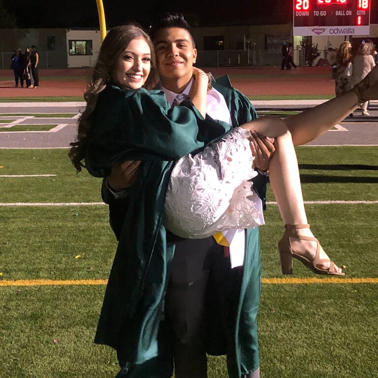 Kara & Christian graduate high school together