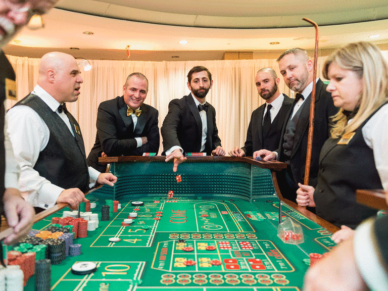 Pop-up casino as a wedding reception entertainment idea.