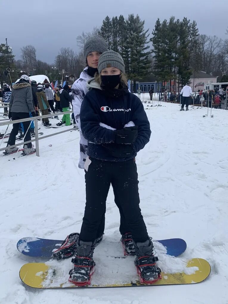 Teaching Collin to snowboard ;)