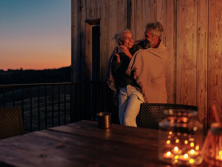 Couple on cabin patio 