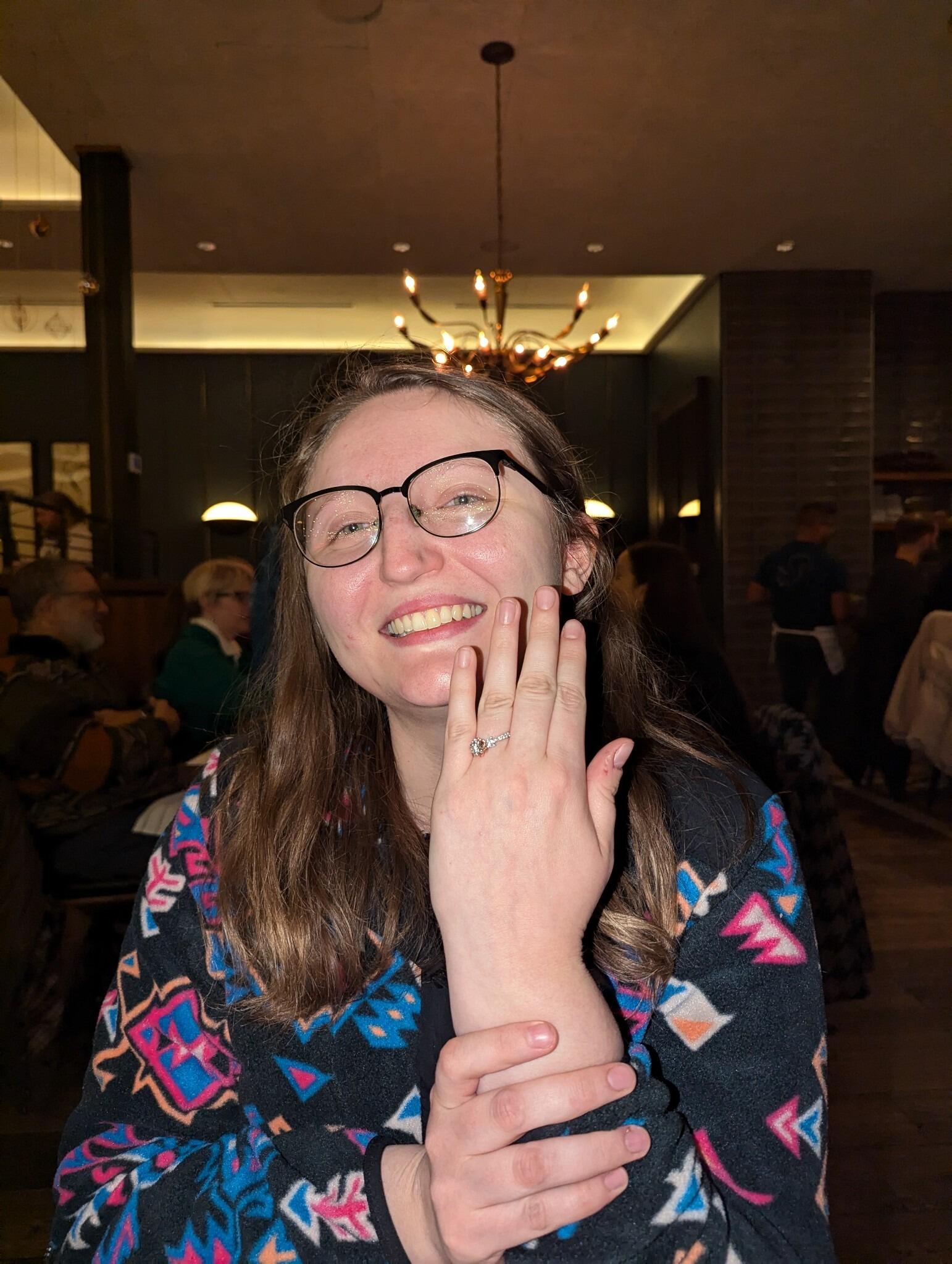 Jess wears the ring!