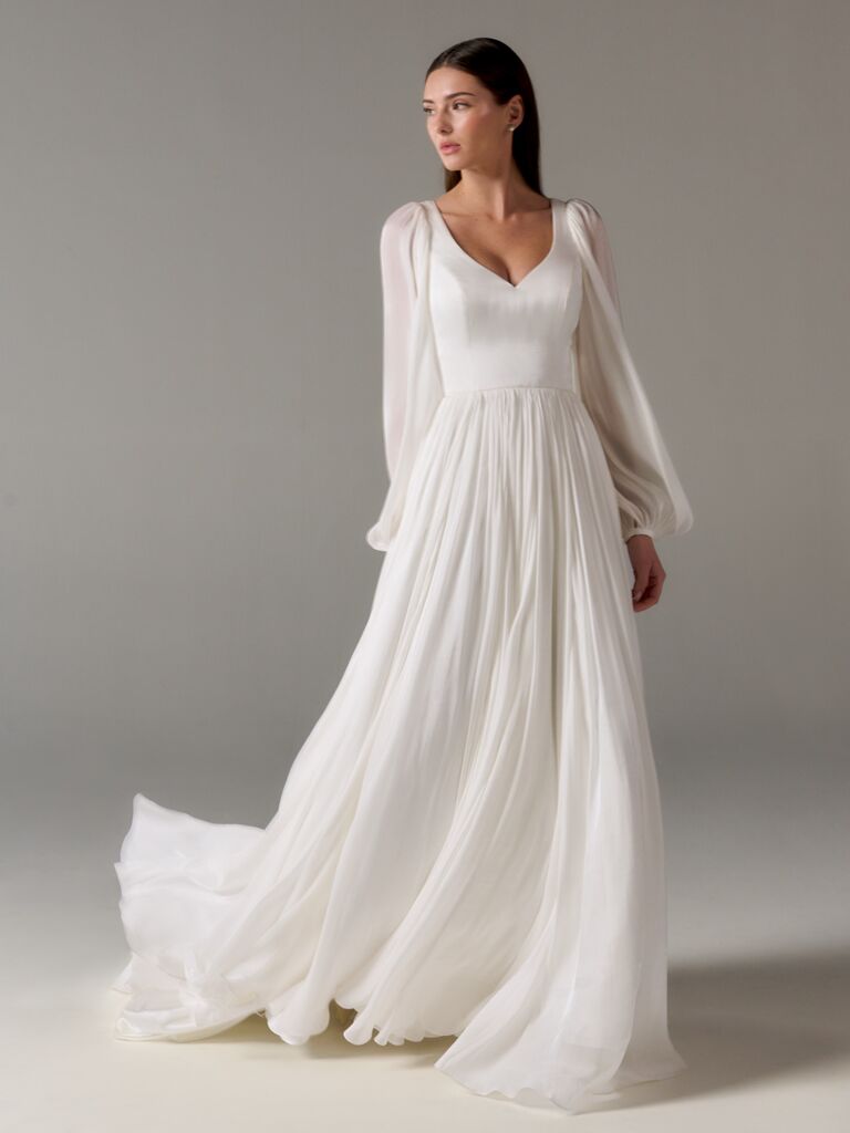 Poeza long-sleeve wedding dress with V-neckline and fluid skirt