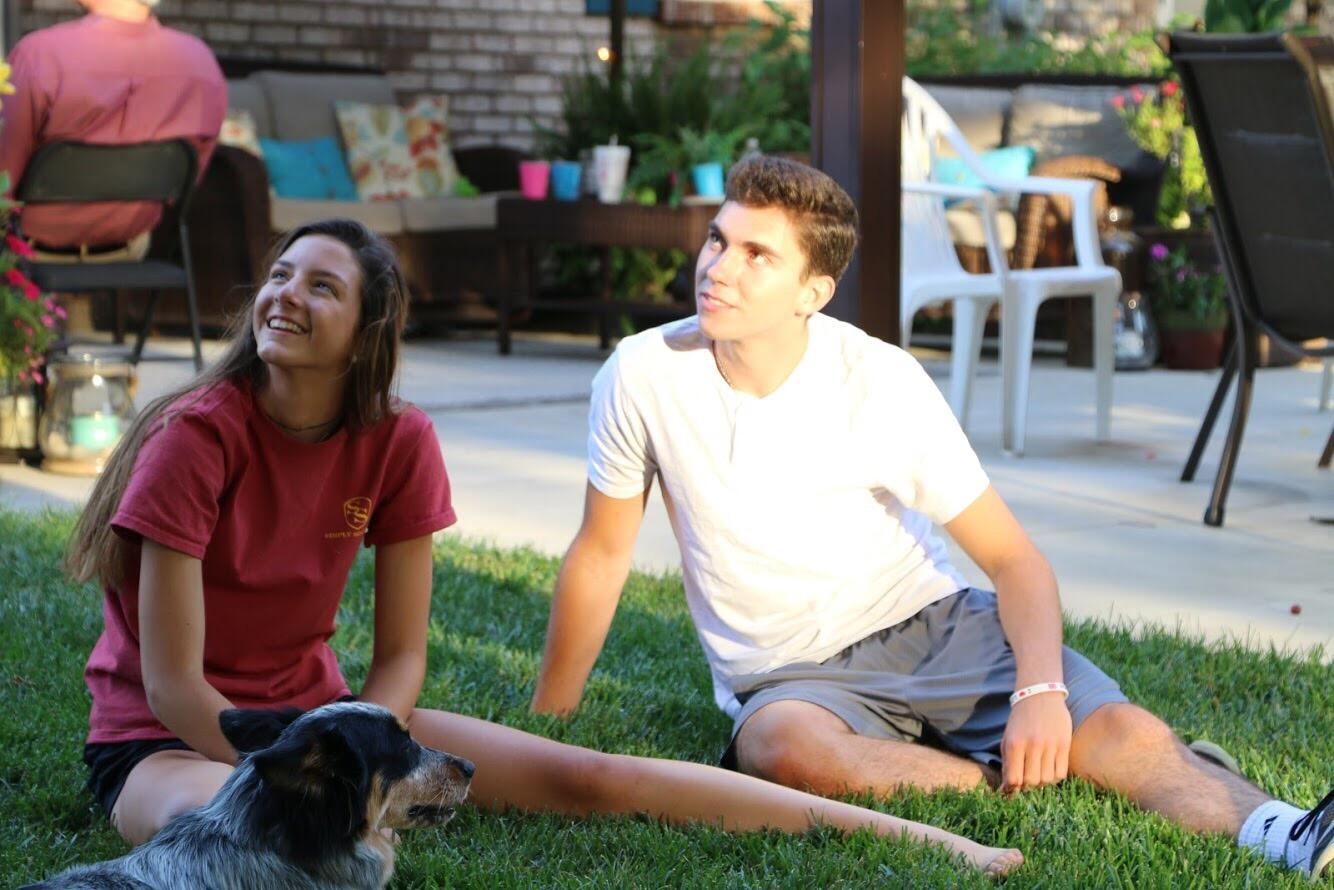 One special day long ago, Shan hosted an event at her home, so Austin got a chance to hang out with her and meet her parents. Here we are chatting while Austin worked up the courage to ask Shan the second-most important question of his life! 😉