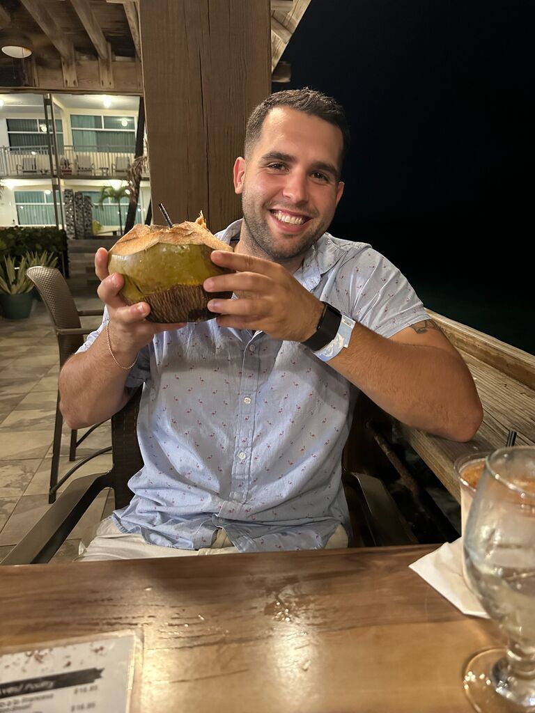 Tyler wanted a photo of his drink inside a coconut on our first night in Rincon, Puerto Rico