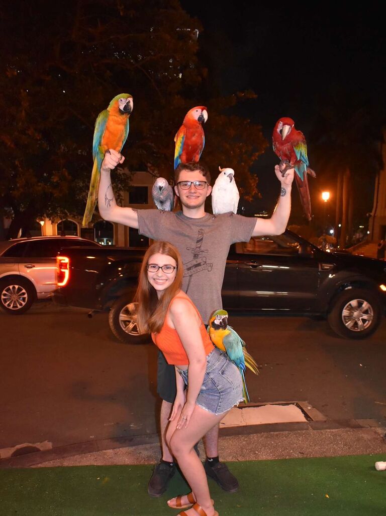 For Katie's senior year spring break, we decided to travel to San Juan, Puerto Rico! This is a picture from our first night there when we were visiting Old San Juan. We will always take any opportunity to hold birds! 