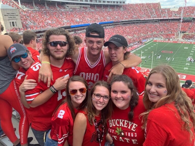 At a home game with friends.
